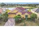 Aerial view of single-Gathering home with yard at 304 Sorrento Road, Poinciana, FL 34759