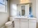 Clean bathroom with toilet, vanity, and tub shower at 304 Sorrento Road, Poinciana, FL 34759