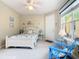 Bedroom with a full bed and private patio access at 304 Sorrento Road, Poinciana, FL 34759