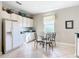 Kitchen features a breakfast nook and plenty of cabinet space at 304 Sorrento Road, Poinciana, FL 34759
