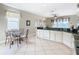 Kitchen boasts ample counter space and a breakfast nook at 304 Sorrento Road, Poinciana, FL 34759