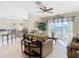 Living room with access to patio and pool view at 304 Sorrento Road, Poinciana, FL 34759