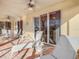 Relaxing patio with lounge chairs and seating area at 304 Sorrento Road, Poinciana, FL 34759