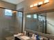 Elegant bathroom with a large mirror and glass shower at 3306 Sagebrush St, Harmony, FL 34773