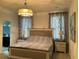 Spacious bedroom with a large bed and plenty of natural light at 3306 Sagebrush St, Harmony, FL 34773