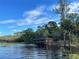 Kayaks and canoes are stored in a lakeside boathouse at 3306 Sagebrush St, Harmony, FL 34773
