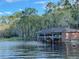 Kayaks and canoes stored in a covered dock at 3306 Sagebrush St, Harmony, FL 34773