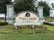 The Lakes at Harmony community entrance sign at 3306 Sagebrush St, Harmony, FL 34773