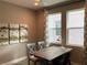 Bright home office with wood desk at 3306 Sagebrush St, Harmony, FL 34773