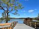 Walkway to a tranquil lakefront area at 3306 Sagebrush St, Harmony, FL 34773