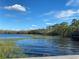 Picturesque lake view with calm water at 3306 Sagebrush St, Harmony, FL 34773