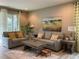Comfortable living room with gray sofas and wood coffee table at 3306 Sagebrush St, Harmony, FL 34773