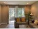 Bright living room with view of lake and golf course at 3306 Sagebrush St, Harmony, FL 34773