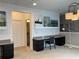 Spacious office with a large desk and white brick walls at 3306 Sagebrush St, Harmony, FL 34773