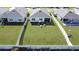 Backyard with large grassy area and fence at 5109 Barombi Bnd, Saint Cloud, FL 34772