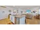 Kitchen with island, stainless steel appliances, and granite countertops at 5109 Barombi Bnd, Saint Cloud, FL 34772