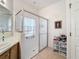Bathroom with walk-in shower and storage at 512 Heartwell Dr, Poinciana, FL 34759