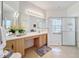Spacious bathroom with walk-in shower and double vanity at 512 Heartwell Dr, Poinciana, FL 34759
