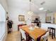 Bright dining area with a table and chairs near the kitchen at 512 Heartwell Dr, Poinciana, FL 34759
