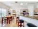 Bright kitchen with granite countertops and stainless steel appliances at 512 Heartwell Dr, Poinciana, FL 34759