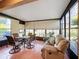 Sunroom with ample natural light and seating area at 512 Heartwell Dr, Poinciana, FL 34759