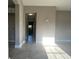 Clean hallway with tile floors and access to other rooms at 907 Columbia St, Orlando, FL 32805