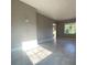 Spacious living room featuring tile floors and ample natural light at 907 Columbia St, Orlando, FL 32805