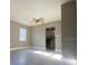 Open living room with tile floors and views into kitchen area at 907 Columbia St, Orlando, FL 32805