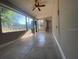 Spacious sunroom with tiled floors and plenty of natural light at 907 Columbia St, Orlando, FL 32805