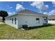 House exterior with a partial view of backyard at 932 Albertville Ct, Kissimmee, FL 34759