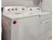 White Whirlpool washer and dryer set in laundry room at 932 Albertville Ct, Kissimmee, FL 34759