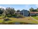 Aerial view of home and backyard with lake view at 10108 Lakeshore Dr, Clermont, FL 34711