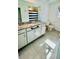 Bathroom with single vanity and shower/tub combo at 11926 Sunsail Ave, Orlando, FL 32832