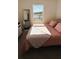 Bedroom with a queen bed and a view of a lake at 11926 Sunsail Ave, Orlando, FL 32832