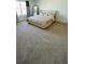 Large bedroom with plush carpeting and ample space at 11926 Sunsail Ave, Orlando, FL 32832
