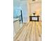 Bright and airy entryway with wood-look flooring at 11926 Sunsail Ave, Orlando, FL 32832