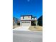 Two-story home with attached garage and driveway at 11926 Sunsail Ave, Orlando, FL 32832