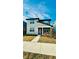 Two-story home with modern facade and landscaping at 11926 Sunsail Ave, Orlando, FL 32832