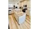 Spacious kitchen featuring granite countertops and an island at 11926 Sunsail Ave, Orlando, FL 32832