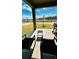 Relaxing patio with lake view and outdoor furniture at 11926 Sunsail Ave, Orlando, FL 32832