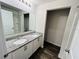 Clean bathroom with double vanity and a separate tub and shower at 1421 Swift Ct, Poinciana, FL 34759