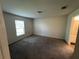 Bright bedroom with window and carpet at 1421 Swift Ct, Poinciana, FL 34759