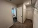 Bedroom with access to bathroom and closet at 1421 Swift Ct, Poinciana, FL 34759