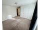 Well-lit bedroom featuring carpeted floors at 1421 Swift Ct, Poinciana, FL 34759