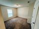 Bright bedroom with carpeted floor and large window at 1421 Swift Ct, Poinciana, FL 34759
