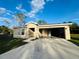 Tan one-story house with attached garage and driveway at 1421 Swift Ct, Poinciana, FL 34759