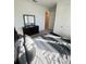 Bright bedroom with dresser and a bed, offering ample space and natural light at 1625 Hill Park Dr, Deltona, FL 32725