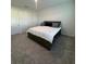 Bedroom with king-size bed and neutral color palette at 1625 Hill Park Dr, Deltona, FL 32725