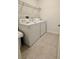 Laundry room with washer and dryer, and overhead shelving at 1625 Hill Park Dr, Deltona, FL 32725