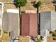 Aerial view showcases the home's roof, backyard, and placement in the neighborhood at 1804 Westminster Trl, Clermont, FL 34714